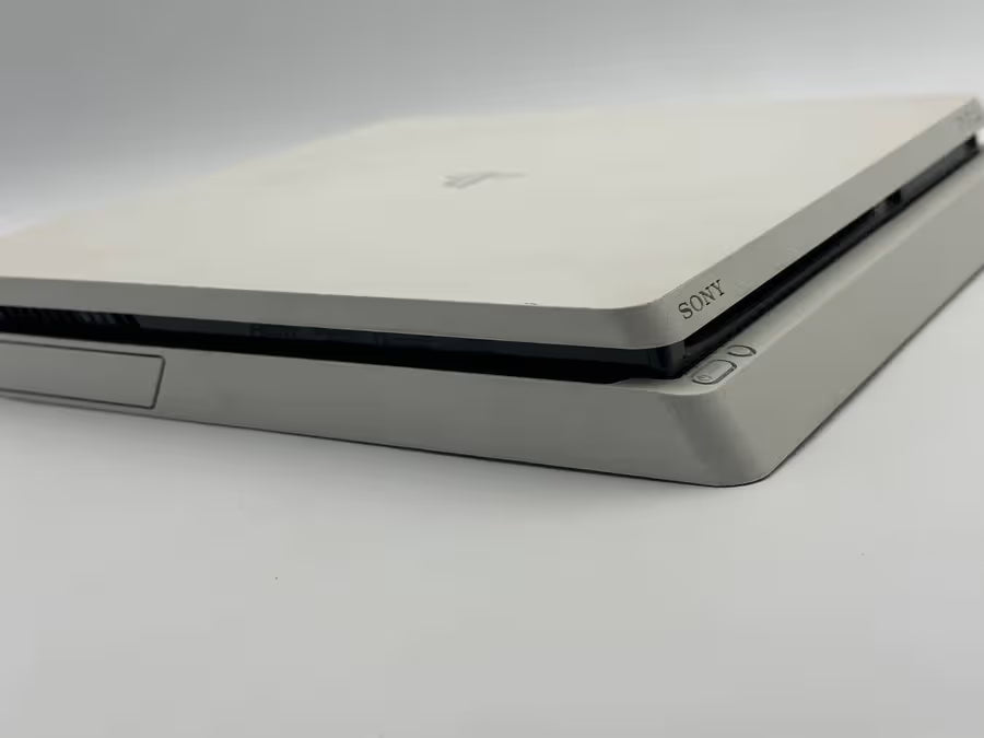 PS4 Slim Glacier White 2 Controllers + 4 Games