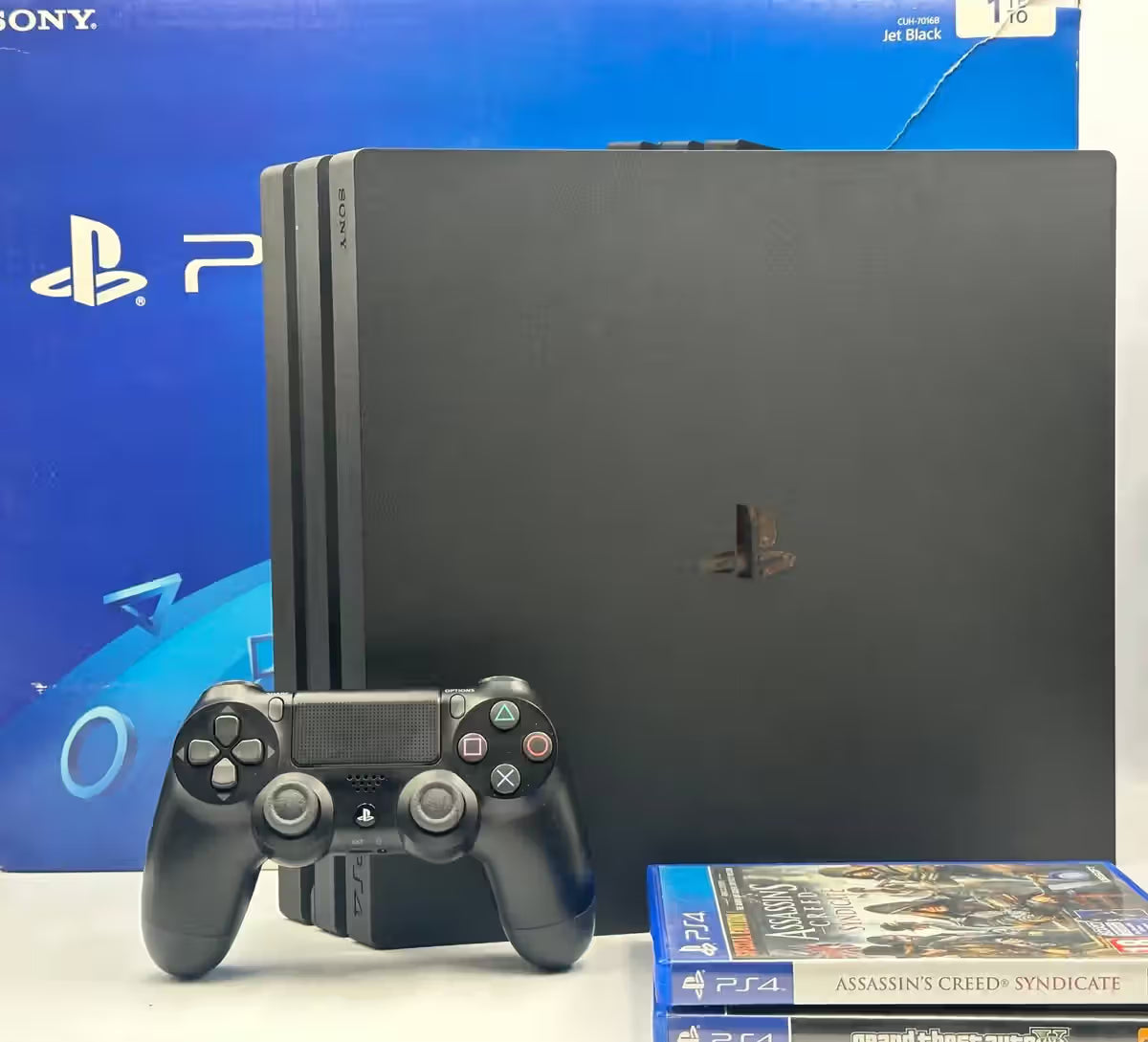 PS4 Pro 1TB  Boxed + GTA V + Assassins Creed